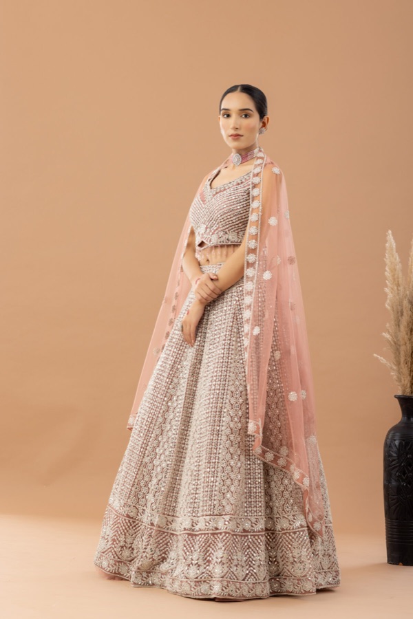 Blush pink lehenga with sheer dupatta drape