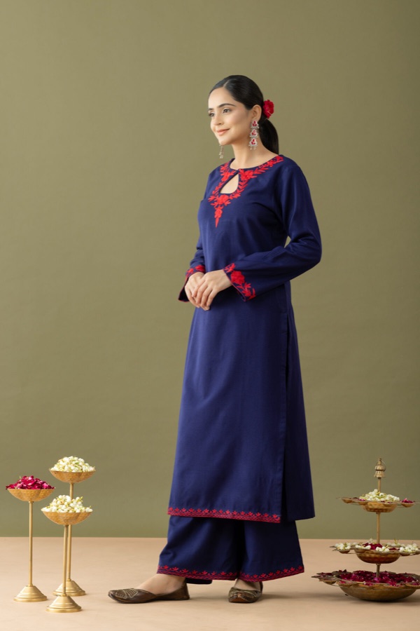 Navy kurta styled with brass props